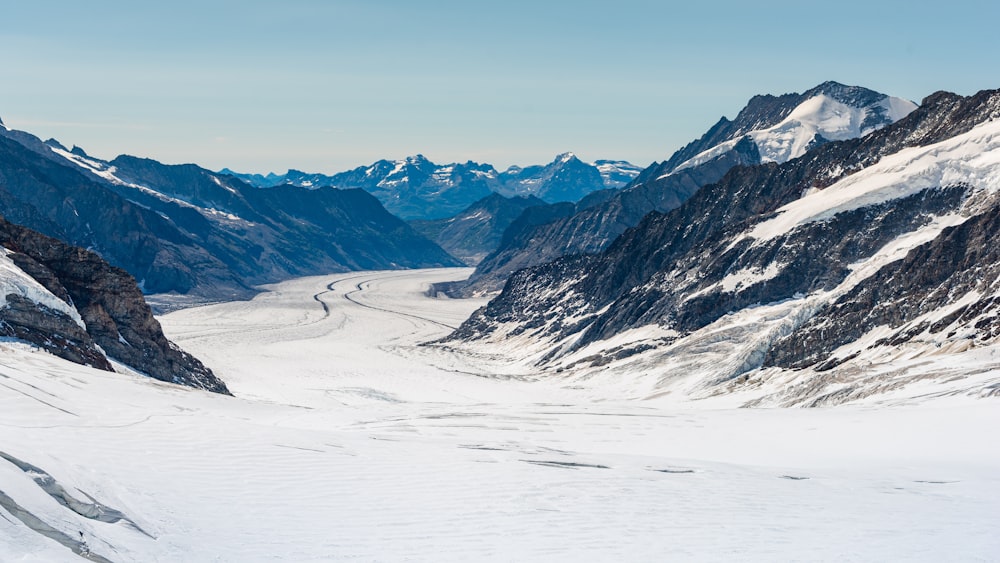 snow covered mountain during daytime