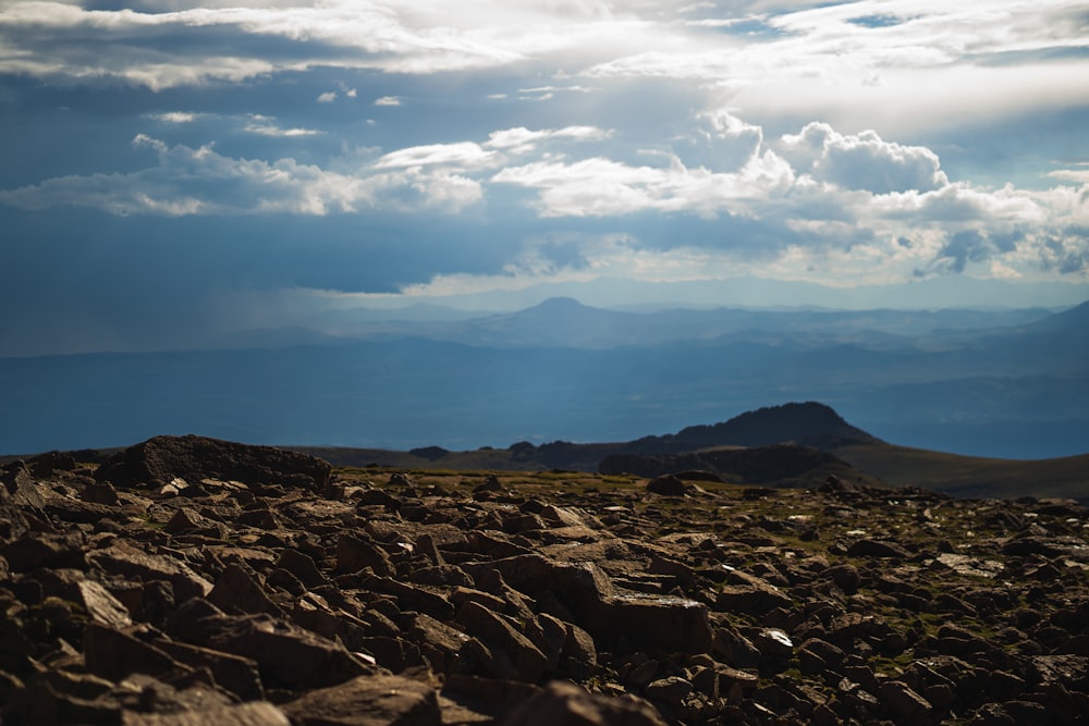 brown rocky mountain under blue sky during daytime