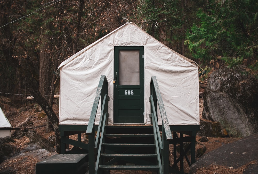 white tent on brown wooden stairs