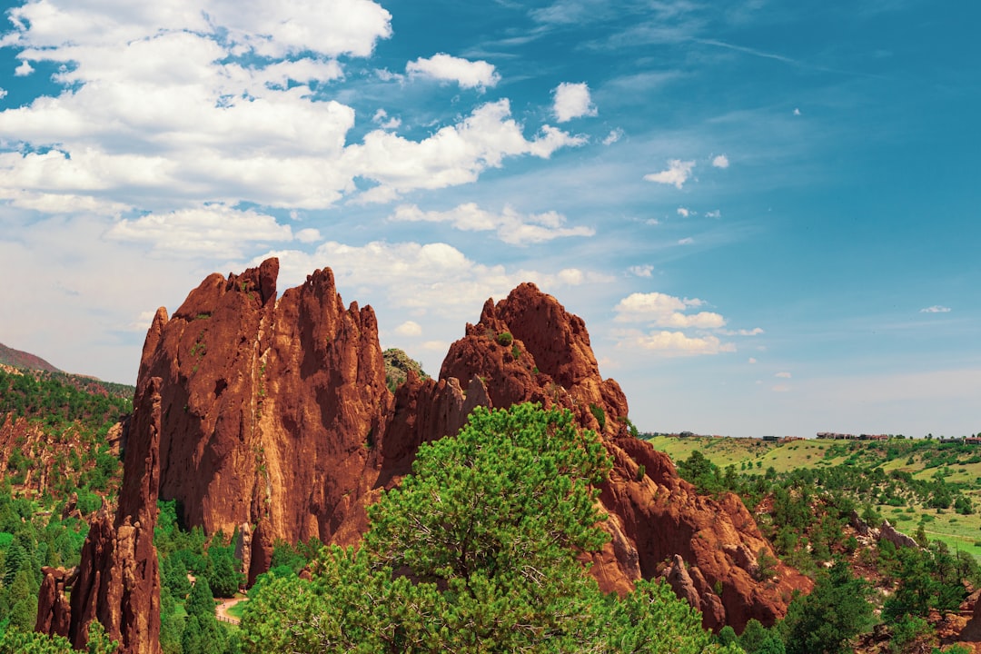 brown rock formation under blue sky during daytime