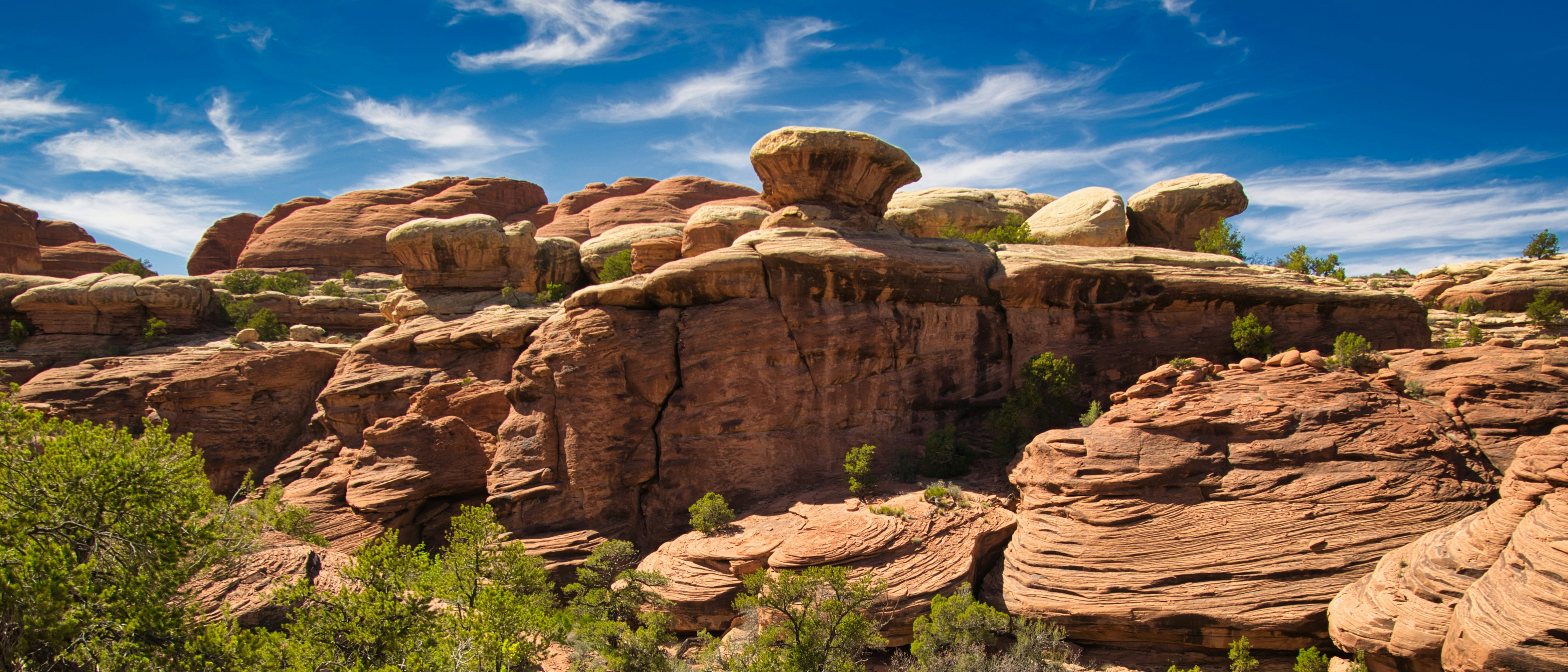 brown rock formation under blue sky during daytime, 