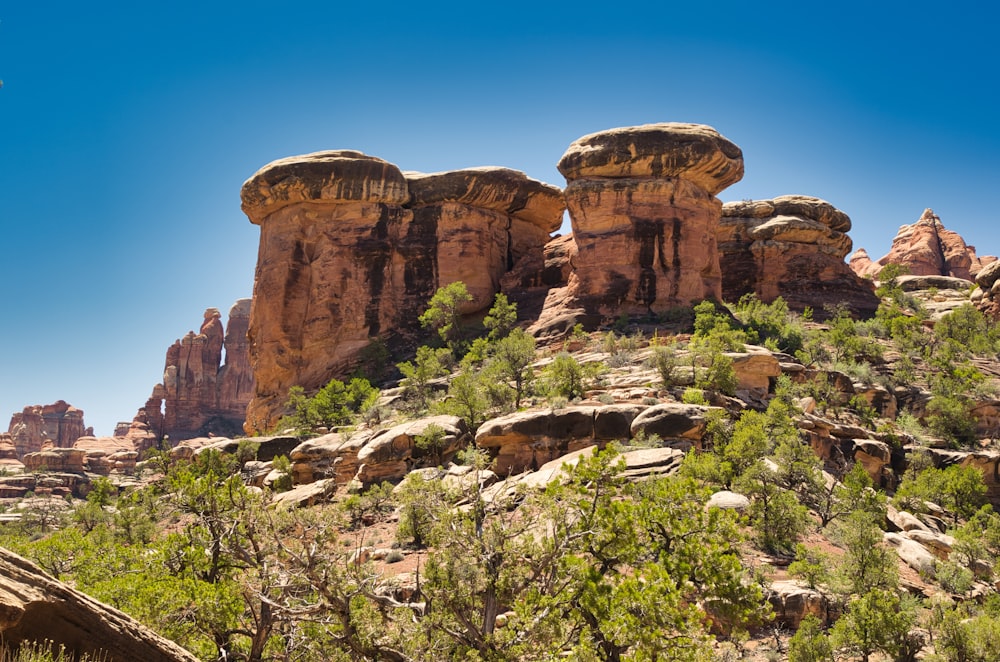 brown rock formation under blue sky during daytime