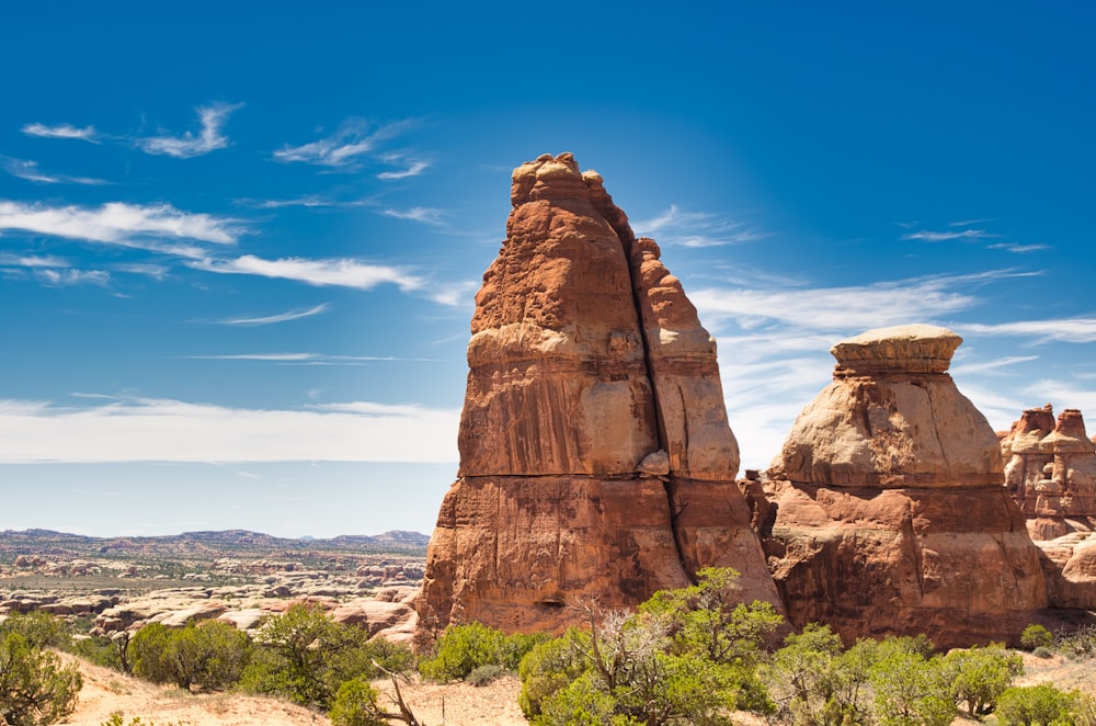 brown rock formation under blue sky during daytime