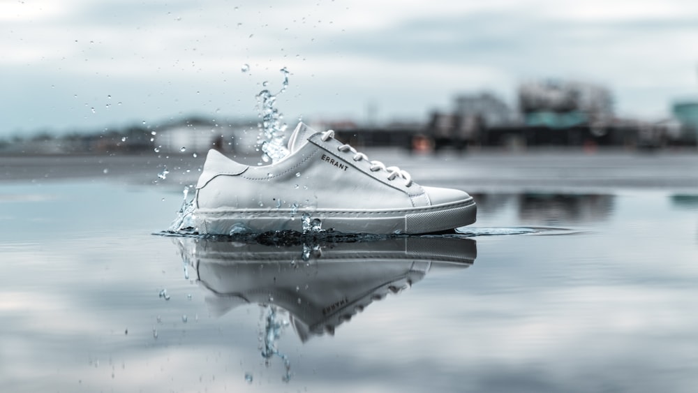 white boat on water during daytime