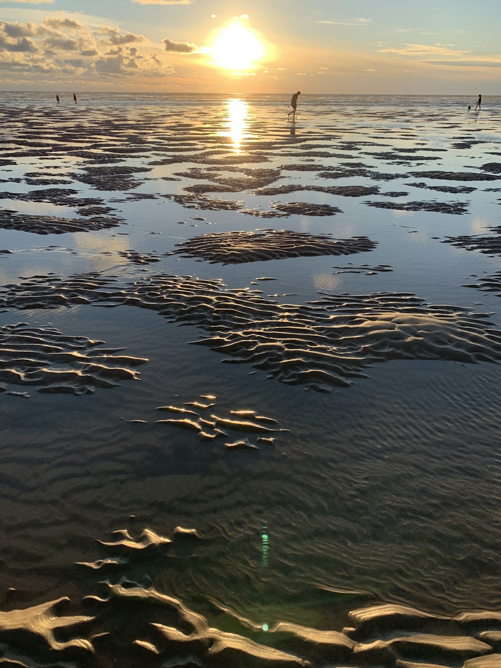 body of water during sunset