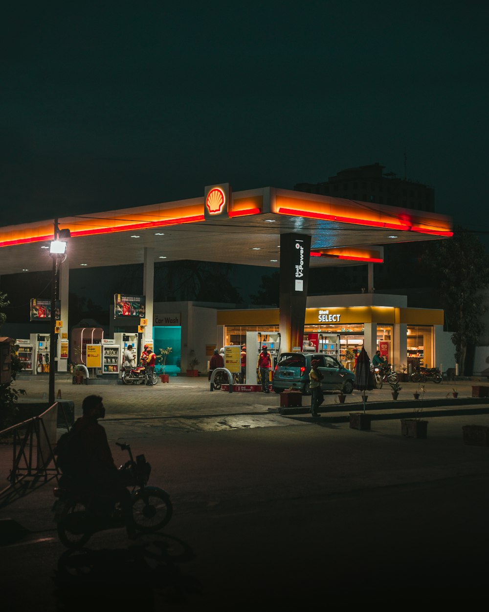 people walking on street during night time