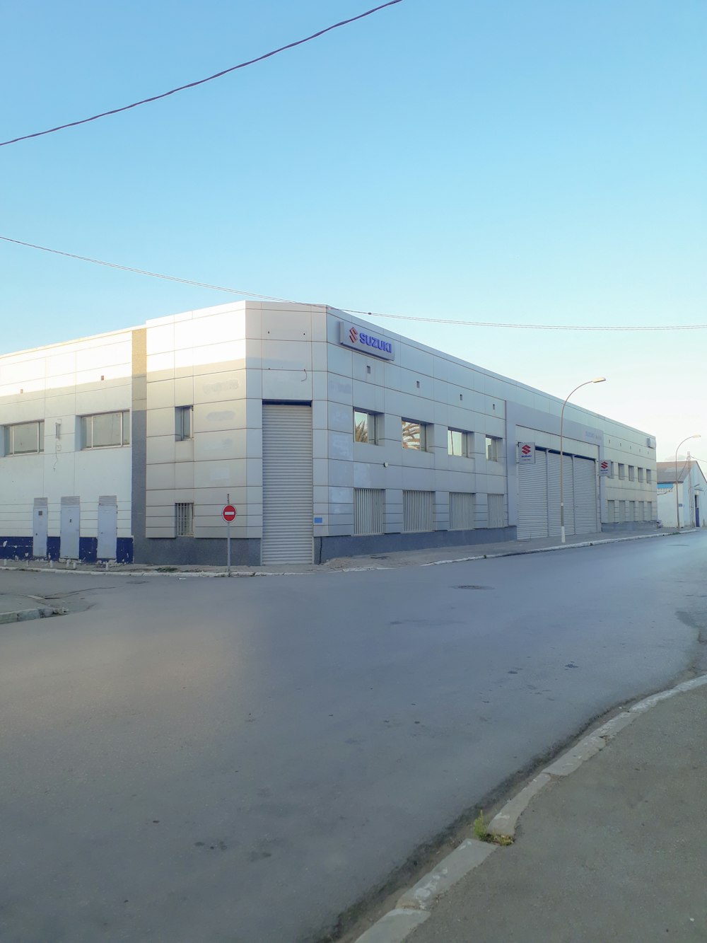 white concrete building near road during daytime