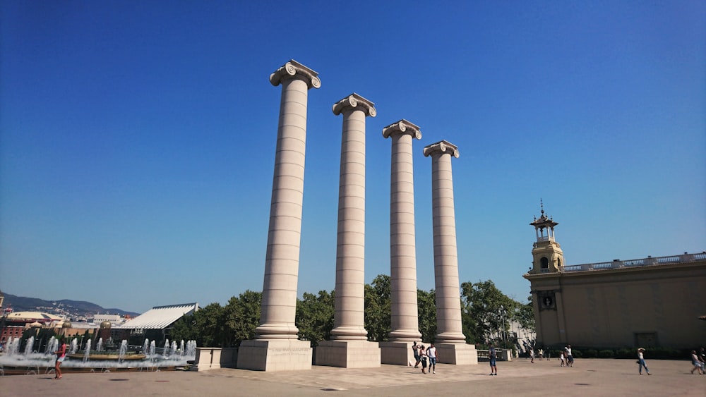 white concrete pillar under blue sky during daytime