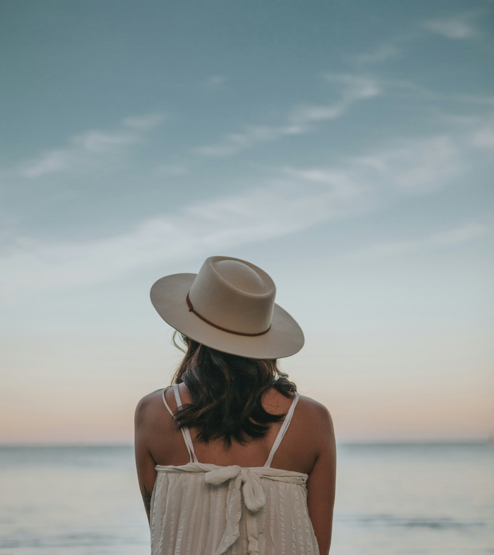 Canon EOS 5D Mark II + Canon EF 24-70mm F2.8L USM sample photo. Woman in white fedora photography