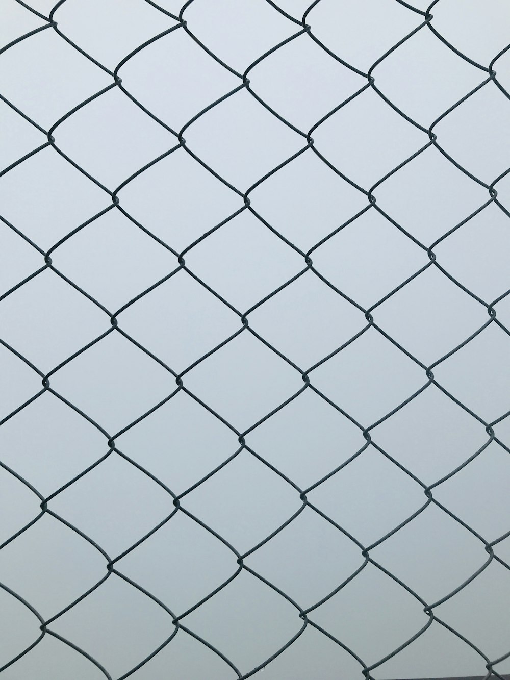 black metal chain link fence