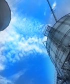 Panoramic view of a finished industrial project with metal structures against a clear sky.
