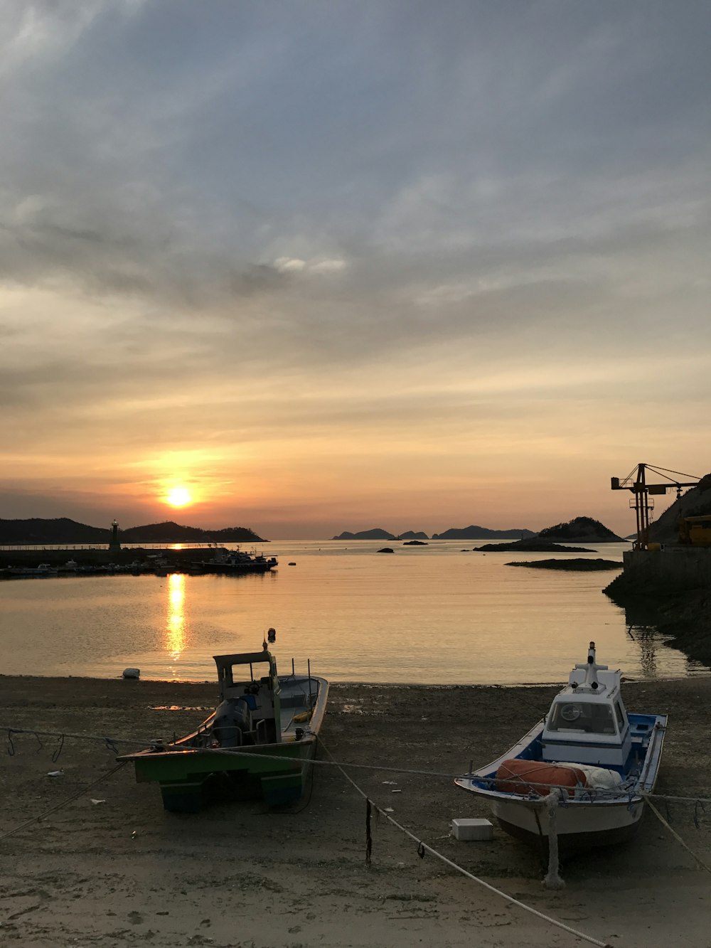 people on beach during sunset