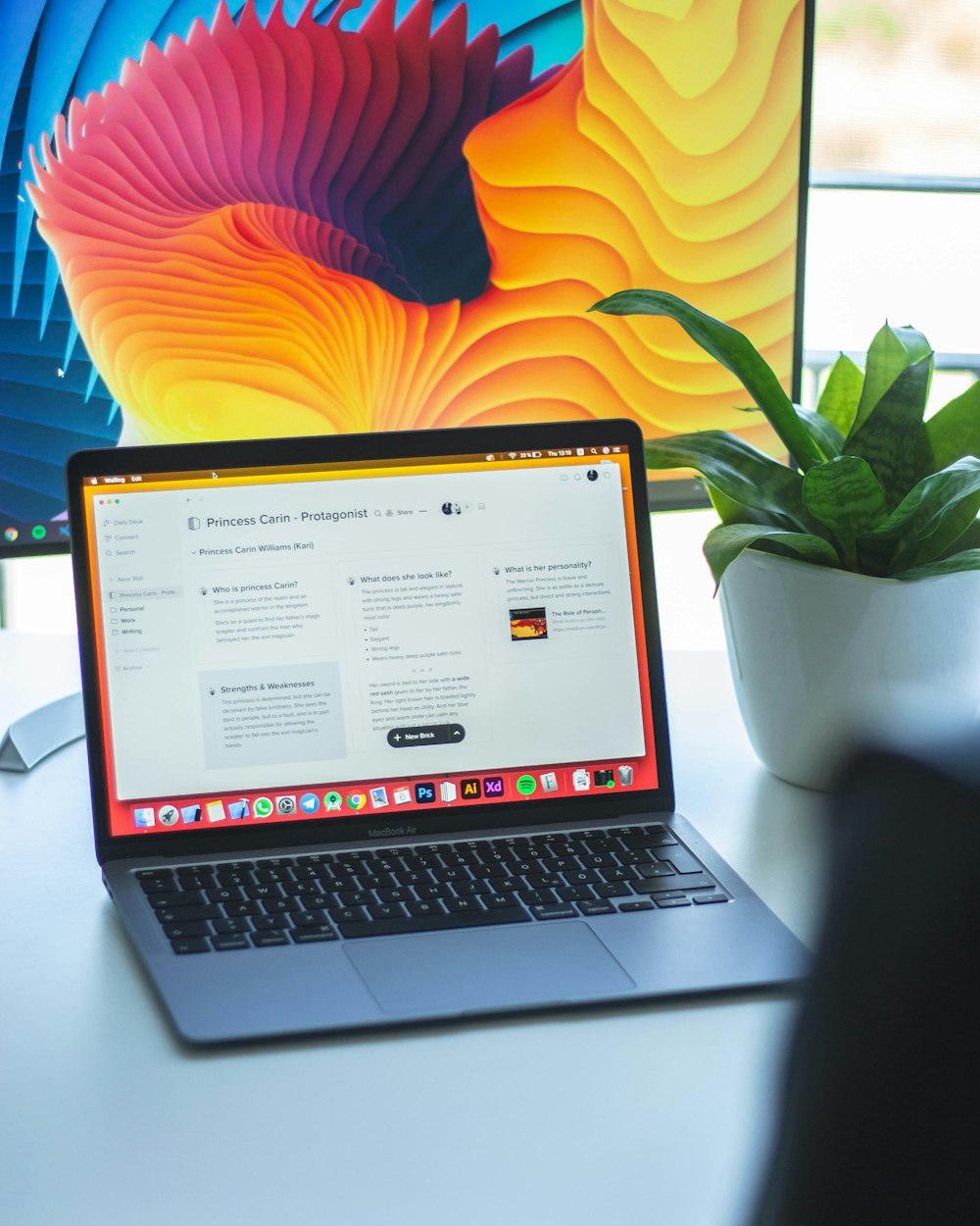 macbook pro on white table