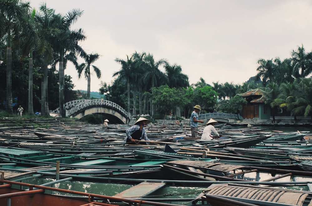 people on boat on river during daytime