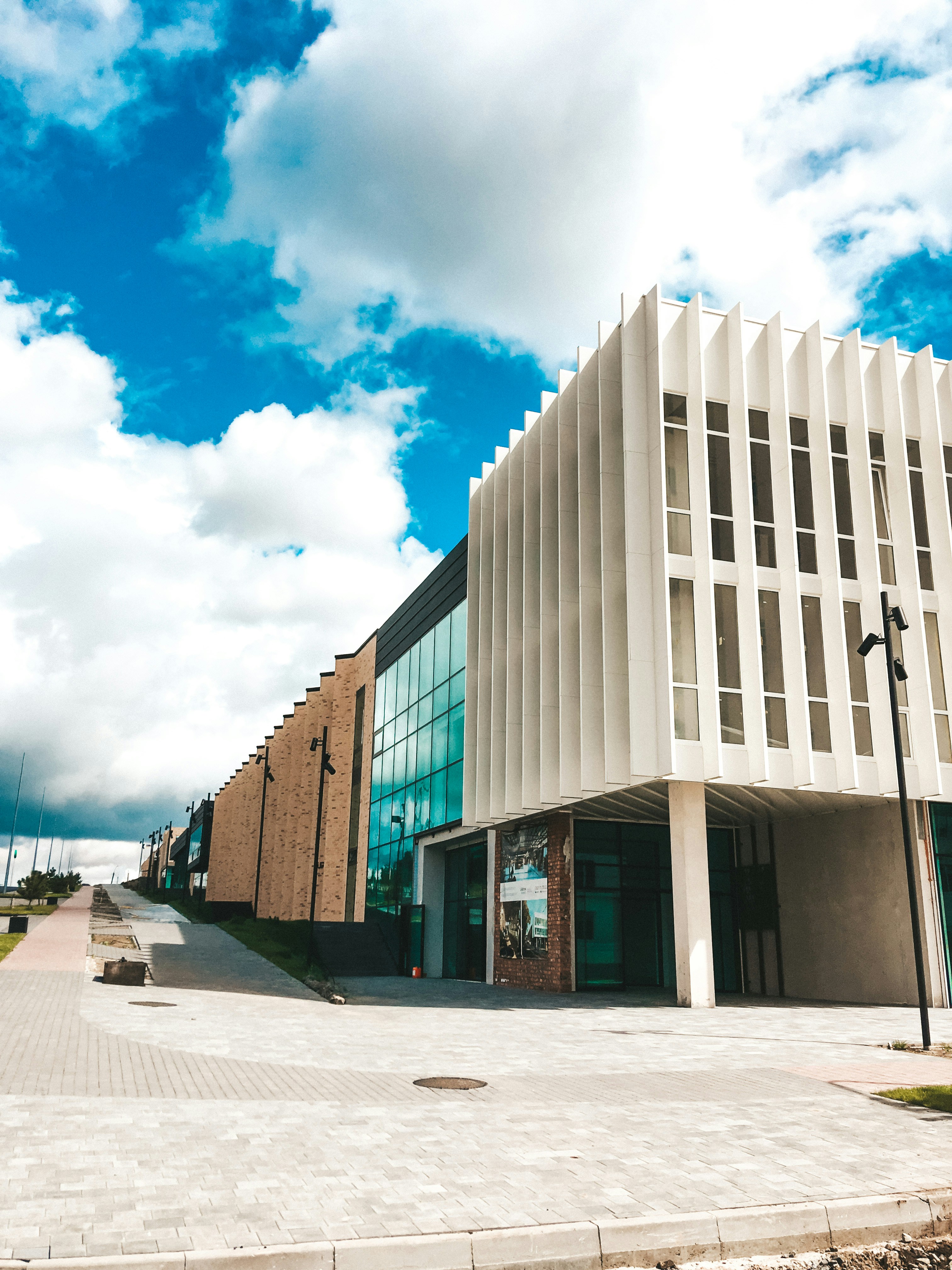 white concrete building under blue sky during daytime
