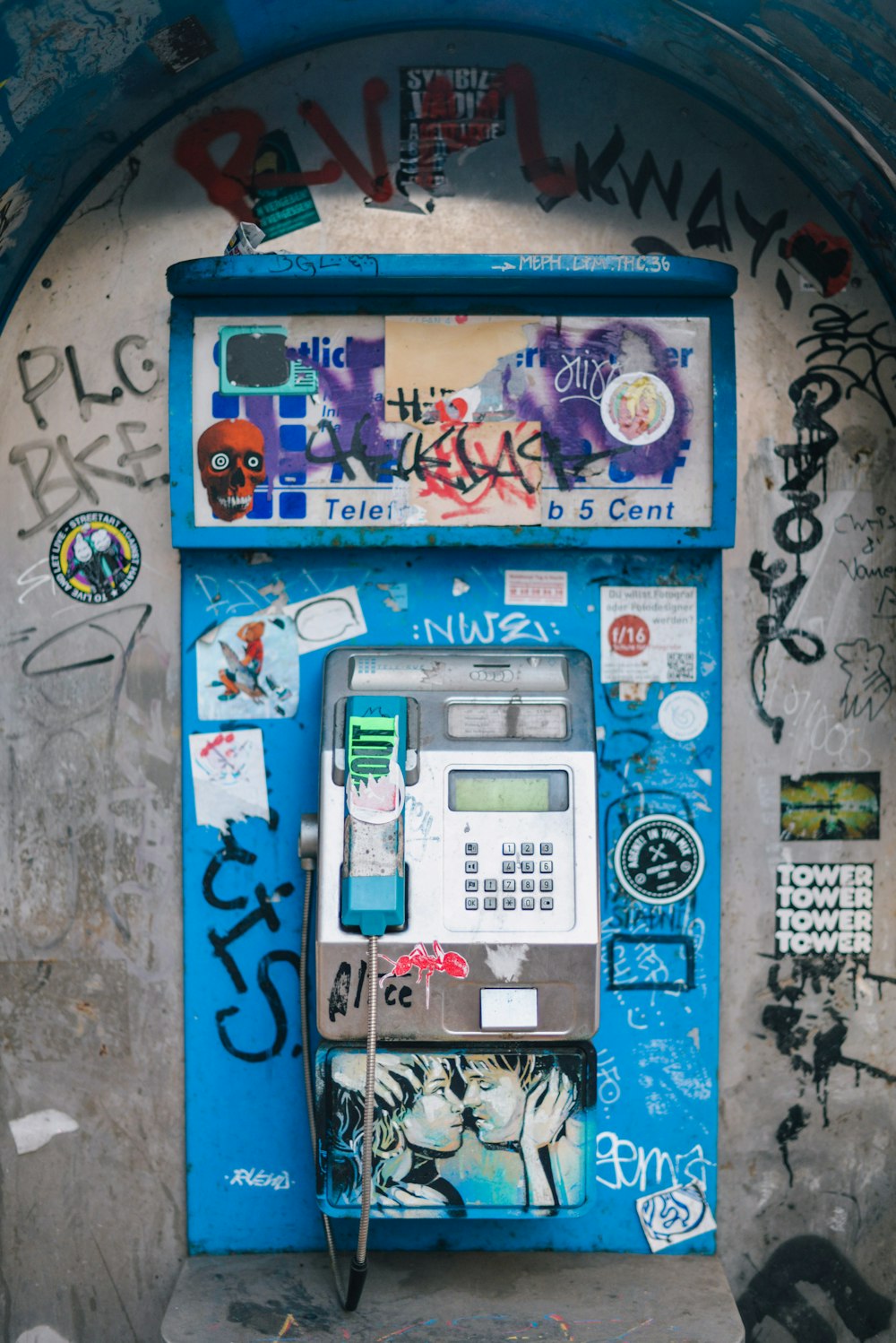 blue and white telephone booth