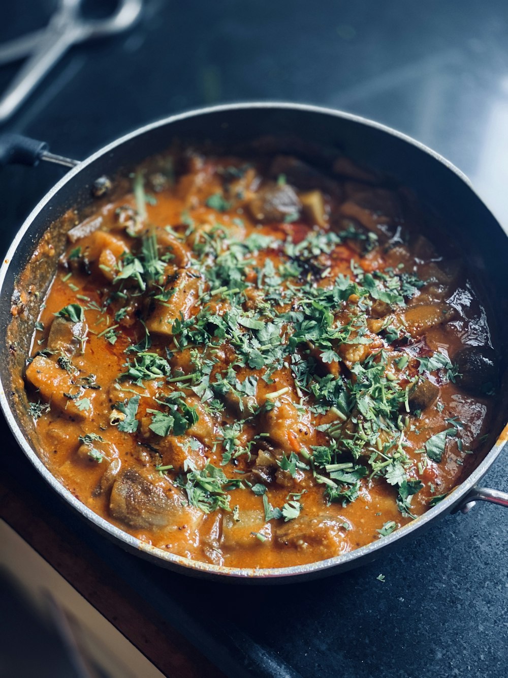 cooked food in black cooking pot