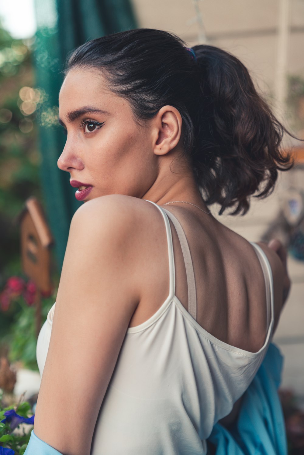 woman in white tank top