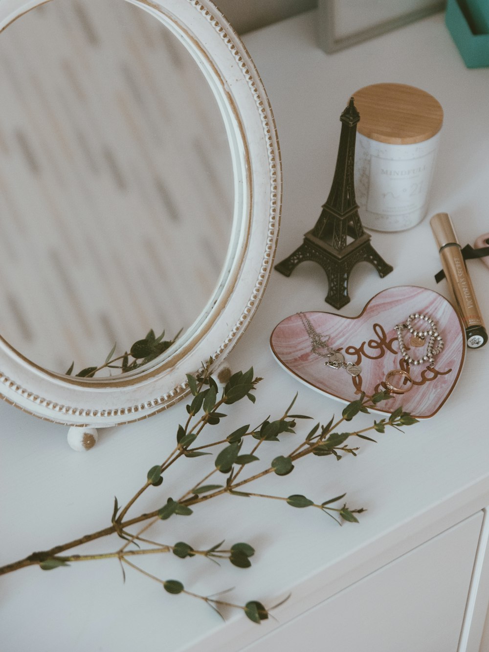 white ceramic round plate on white table