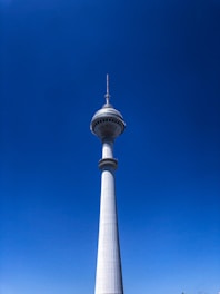white and blue tower under blue sky during daytime