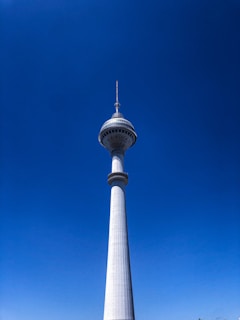 white and blue tower under blue sky during daytime