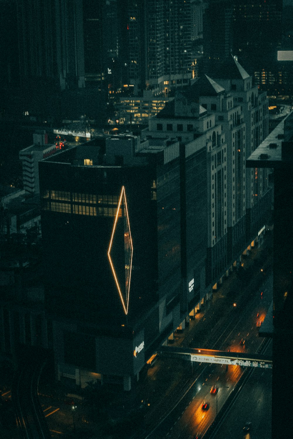 an aerial view of a city at night