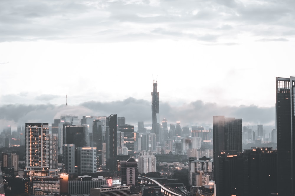 city skyline under white sky during daytime