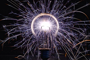 white and black ferris wheel during night time