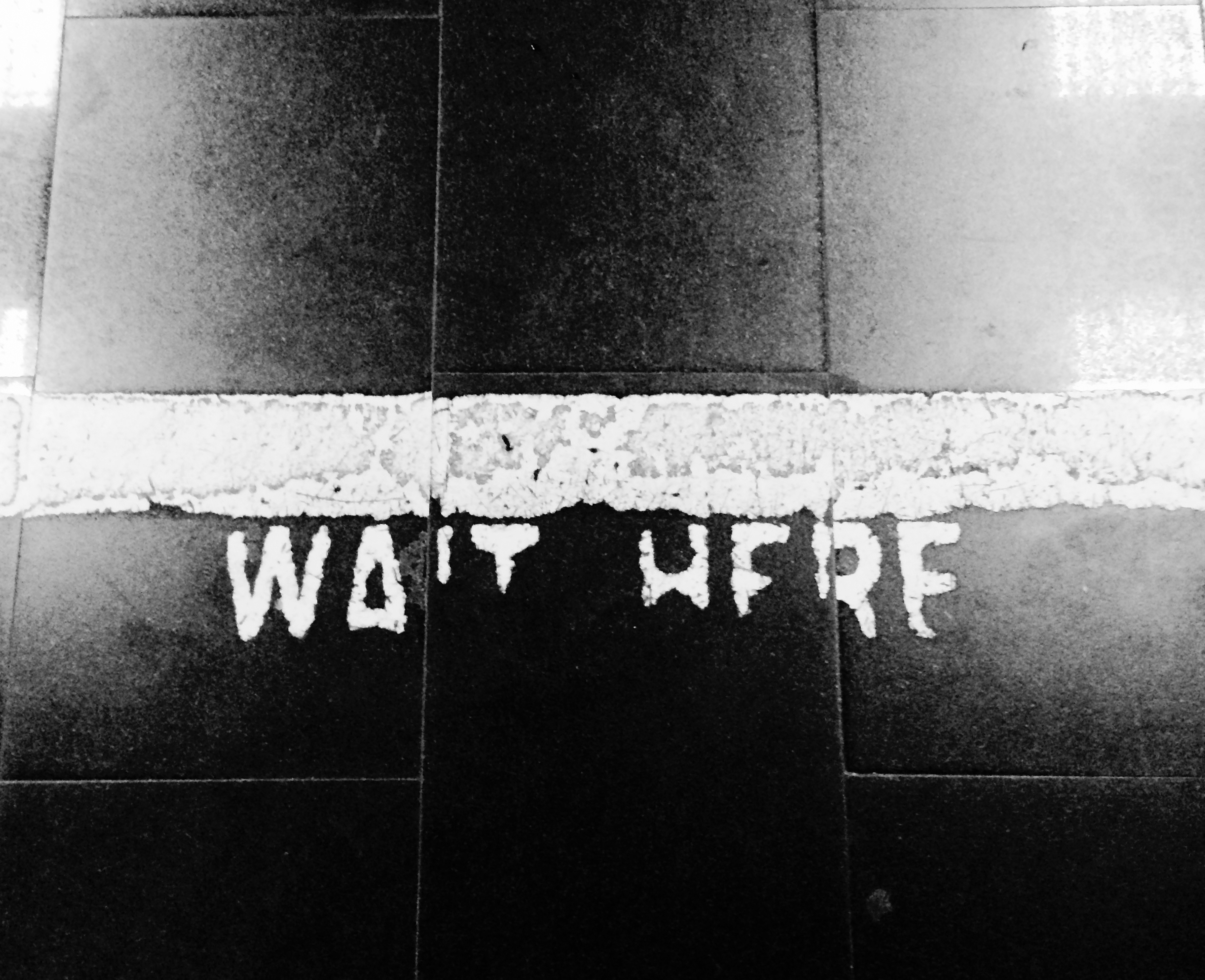 Just to my left, a soldier dude stood with an AK-47. So I did what any one would; took a pic of the 'wait here' sign and did not make any sudden movements. 