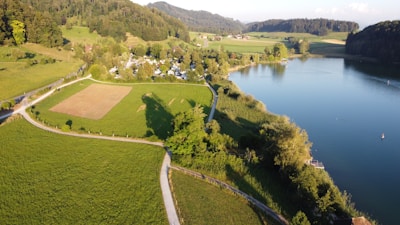 A serene landscape showing different types of properties, representing various land disputes.