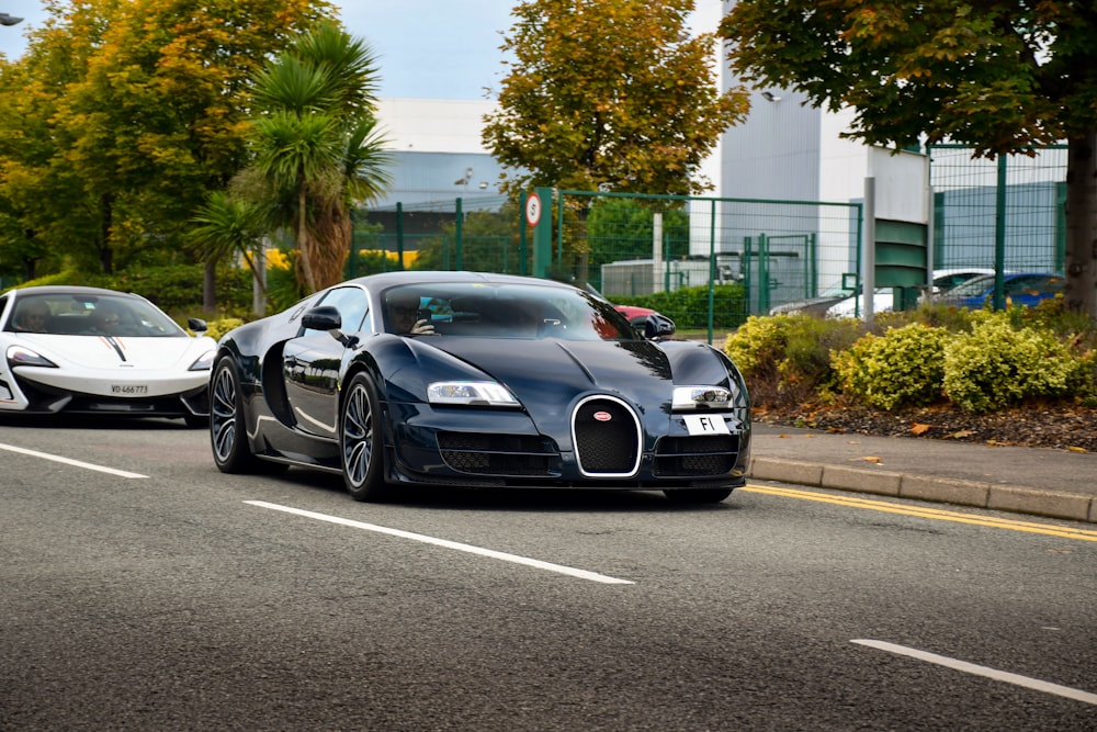 black porsche 911 on road during daytime