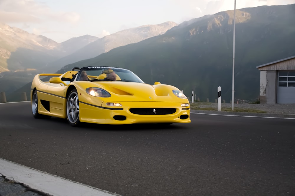 yellow ferrari 458 italia on road during daytime