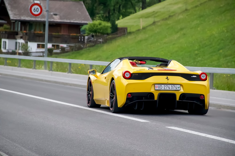 yellow ferrari 458 italia on road during daytime