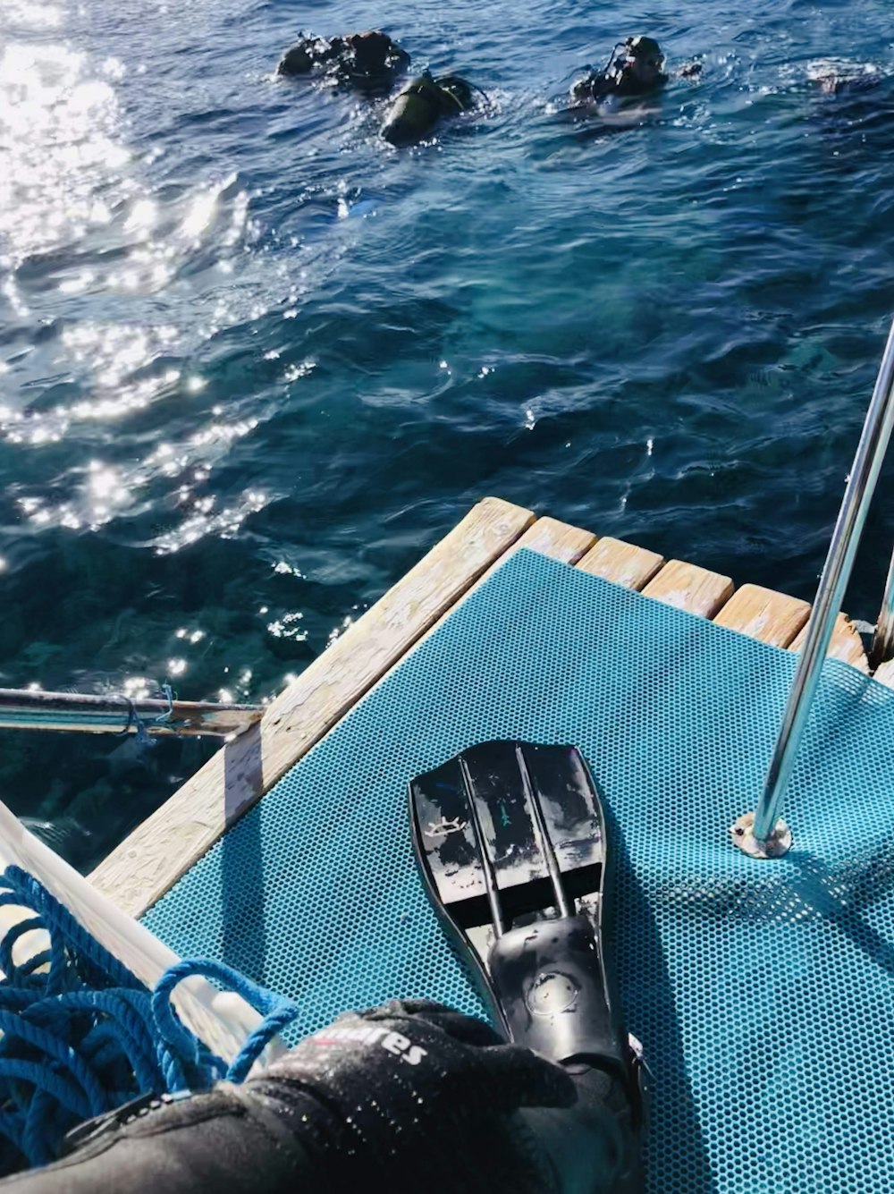 black and white power boat on blue water