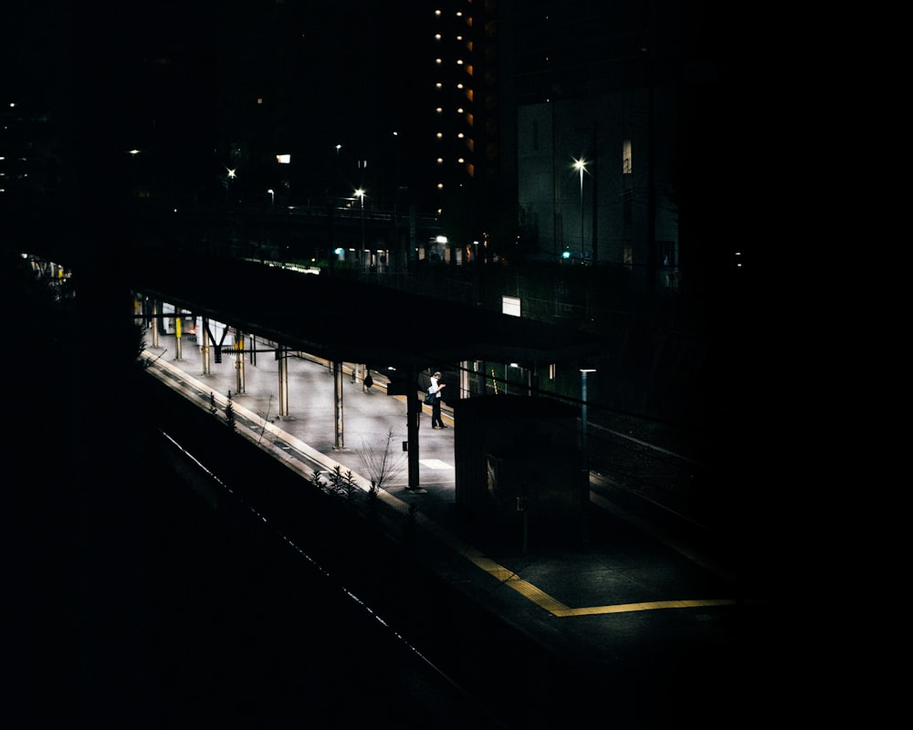 black and white city buildings during night time