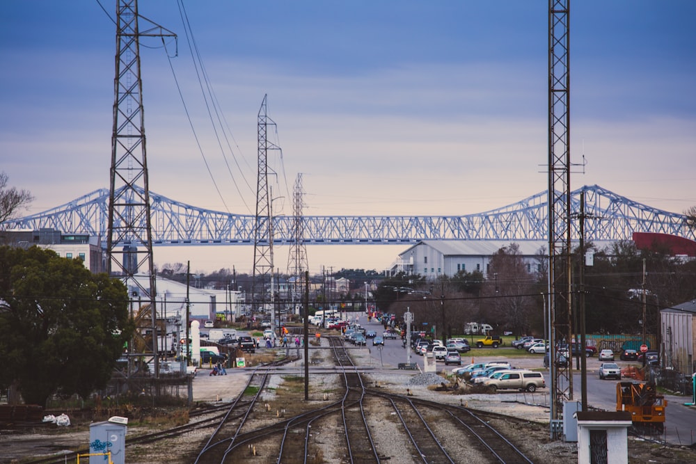 cars on road near bridge during daytime