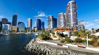 city skyline near body of water during daytime