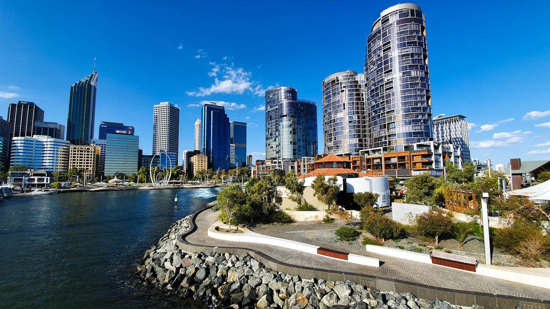 city skyline near body of water during daytime