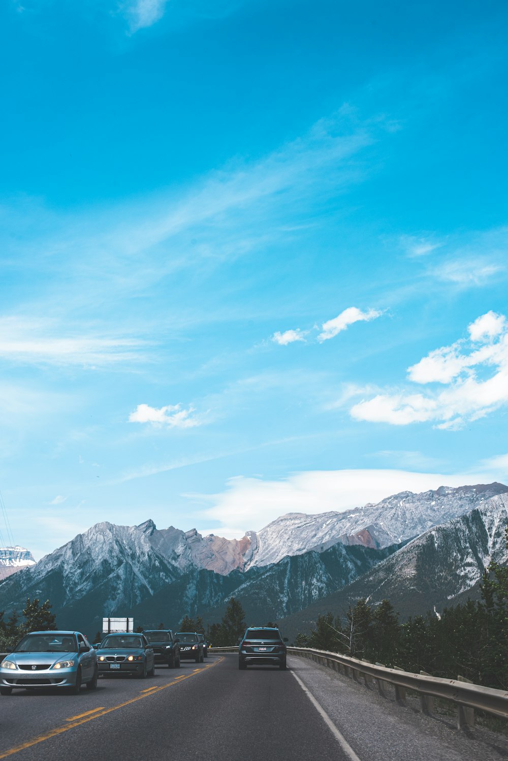 snow covered mountains under blue sky during daytime