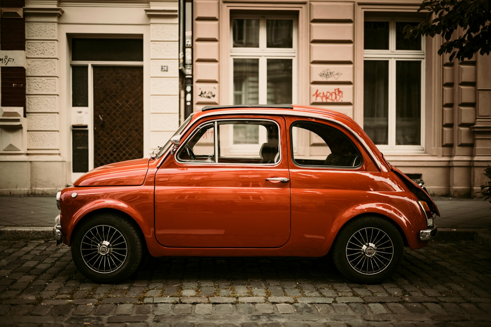 Leica M10-P sample photo. Red volkswagen beetle parked photography