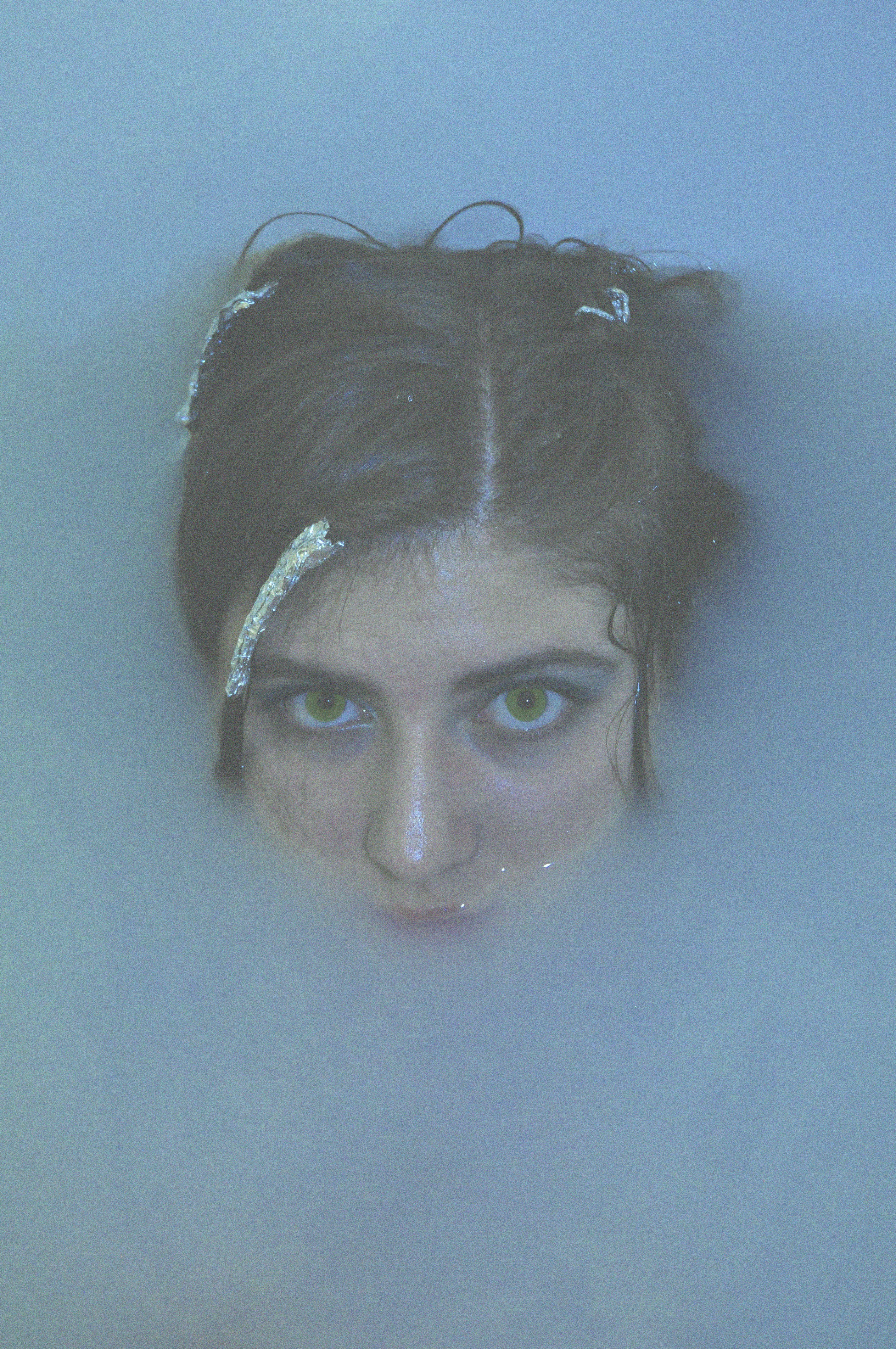 woman with black hair and blue eyes