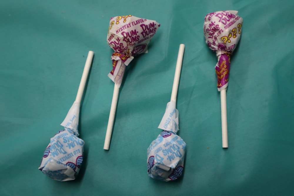 three blue and red lollipop