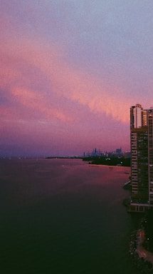 A high-rise building in a city skyline.