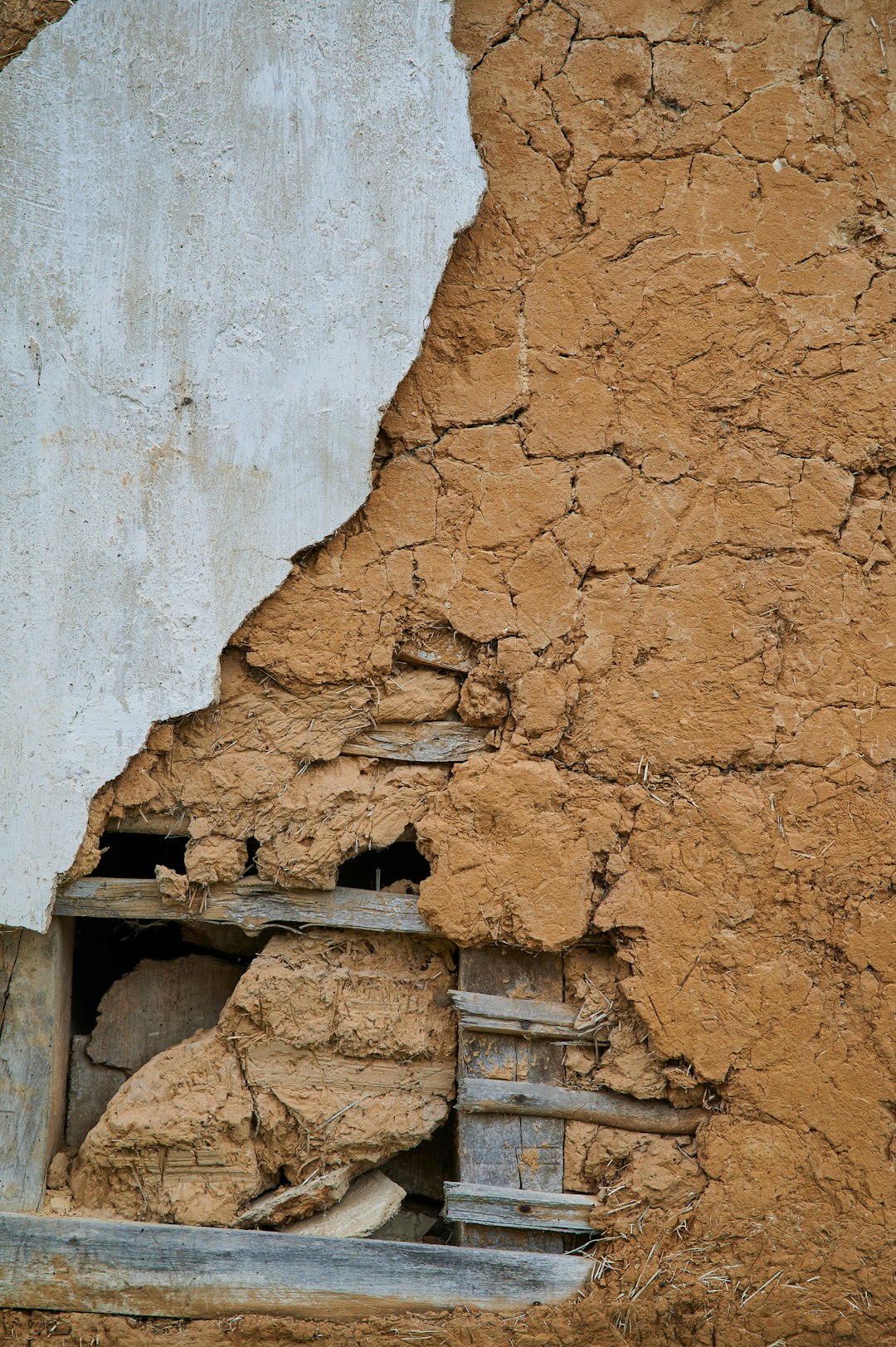brown concrete brick wall during daytime