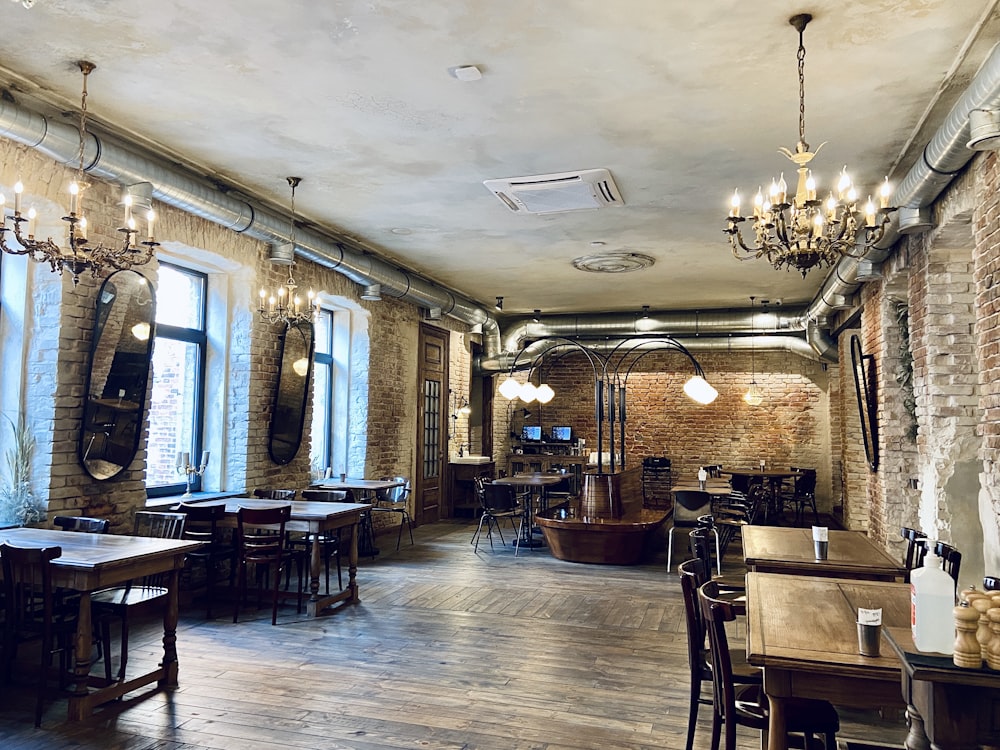 brown wooden chairs and tables inside restaurant