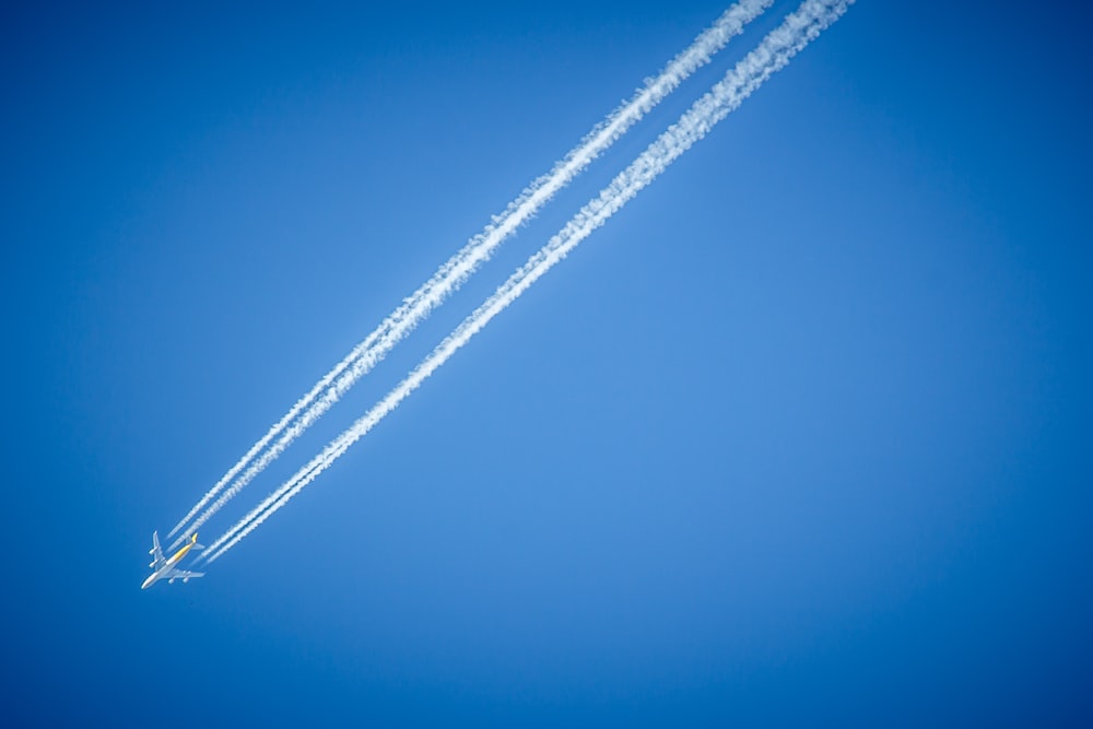 white electric wires under blue sky