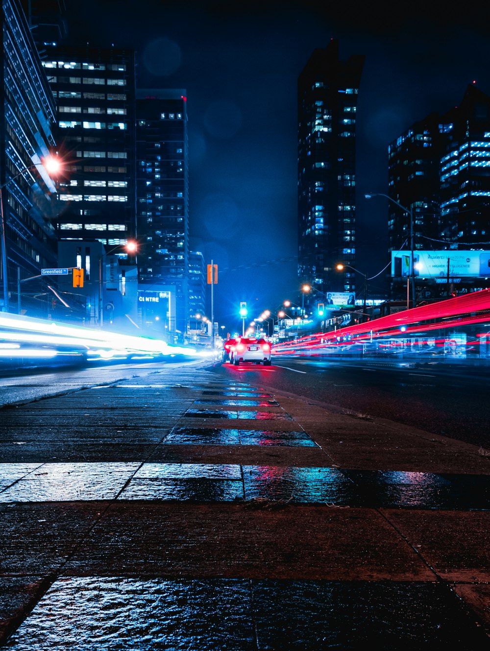 Cars on road during night time photo – Free Road Image on Unsplash