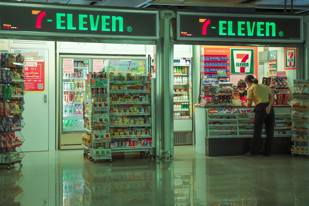 green and white store signage