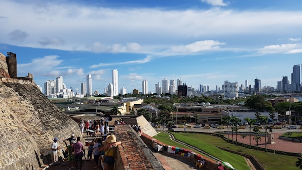 A corporate team bonding on a guided city walking tour with historic landmarks.