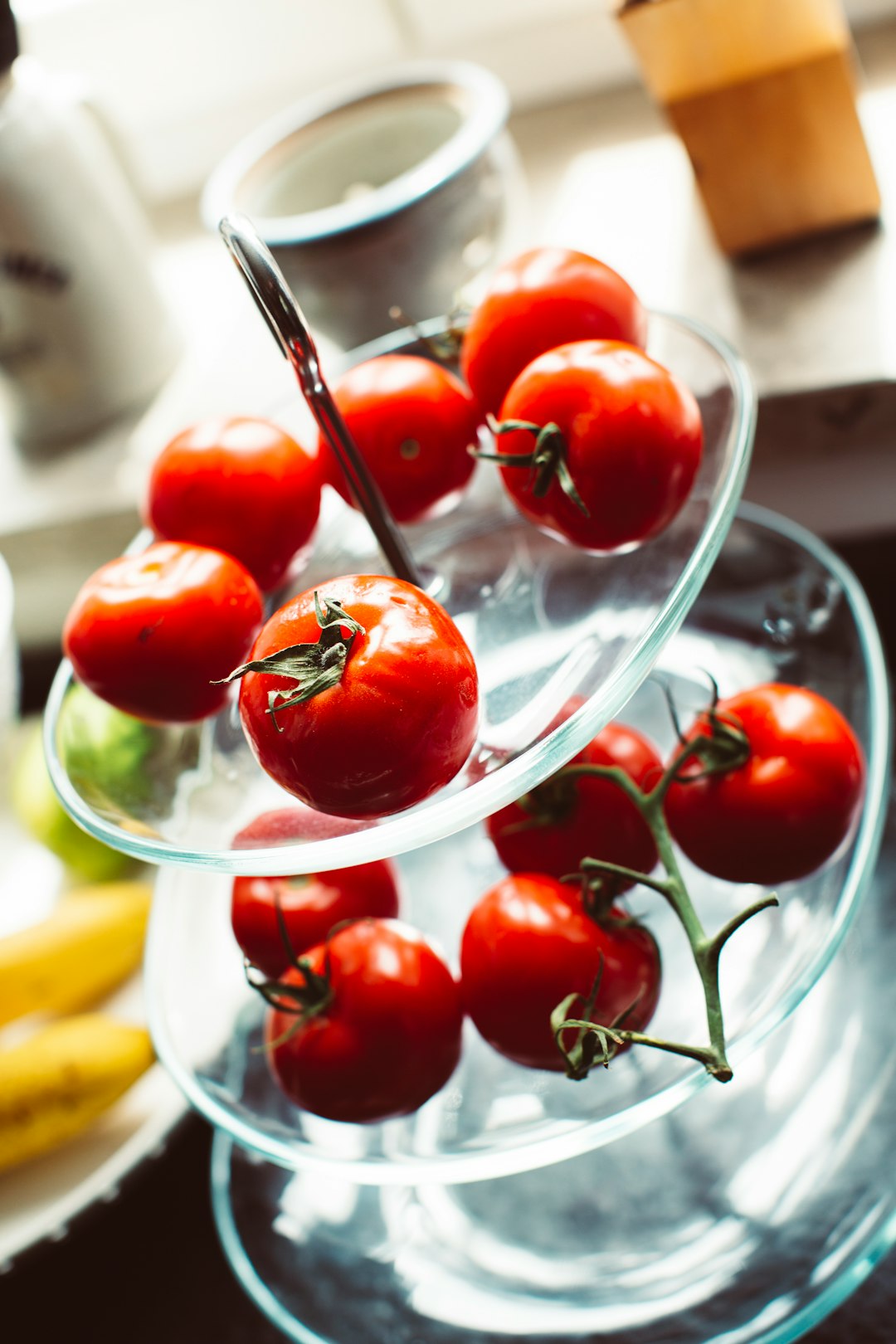 red cherry fruit on clear glass bowl